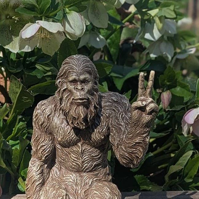 John Bernard & Company - Wholesale Decorative Figurine - Bigfoot Peace Sign Sasquatch Statue 10 inch H Shelf Sitter10