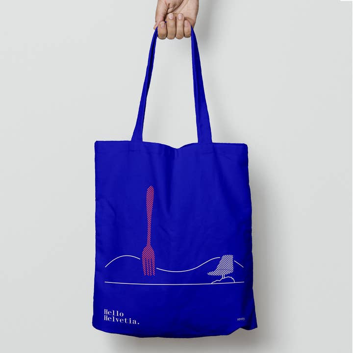 Blauwe draagtas | 100% biologisch zwaar katoen | Motief „Vevey” voor wholesale door Hello Helvetia