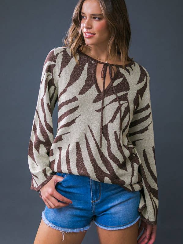 A metallic yarn sweater knit top - ISW5198 and other Purchase Wholesale metallic foil sweater. Free Returns & Net 60 Terms on Faire trending on Faire.