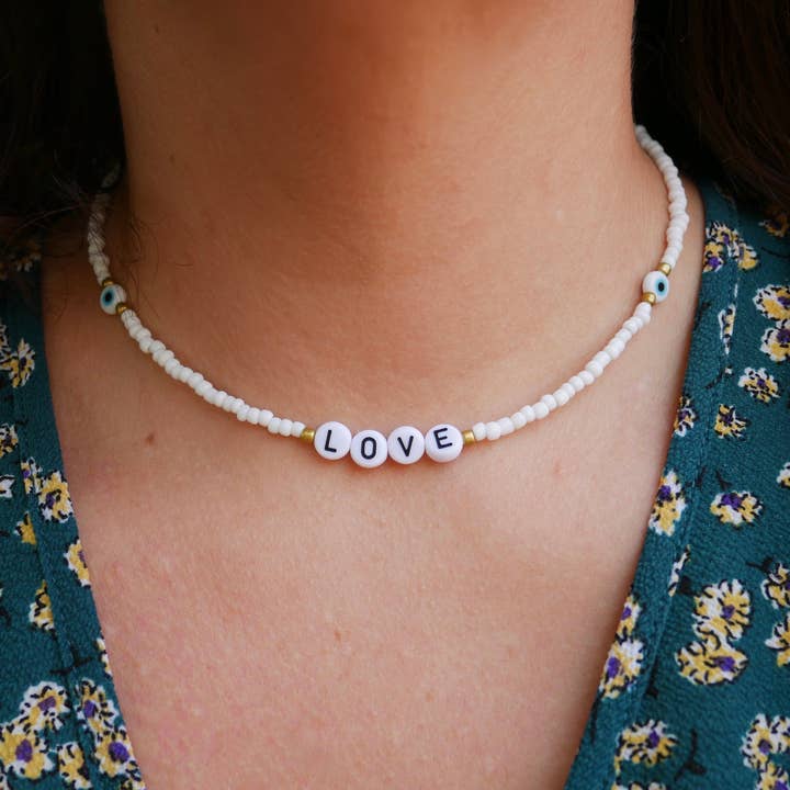 Lucky charm necklace with white pearls and Turkish eye for wholesale by Boutique Bohème