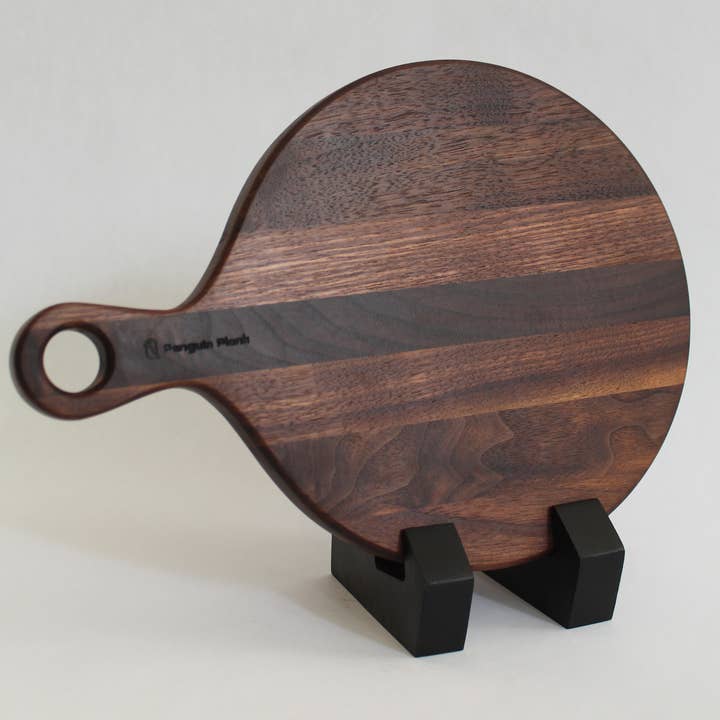 Rund ostbricka i valnöt för wholesale av Penguin Plank