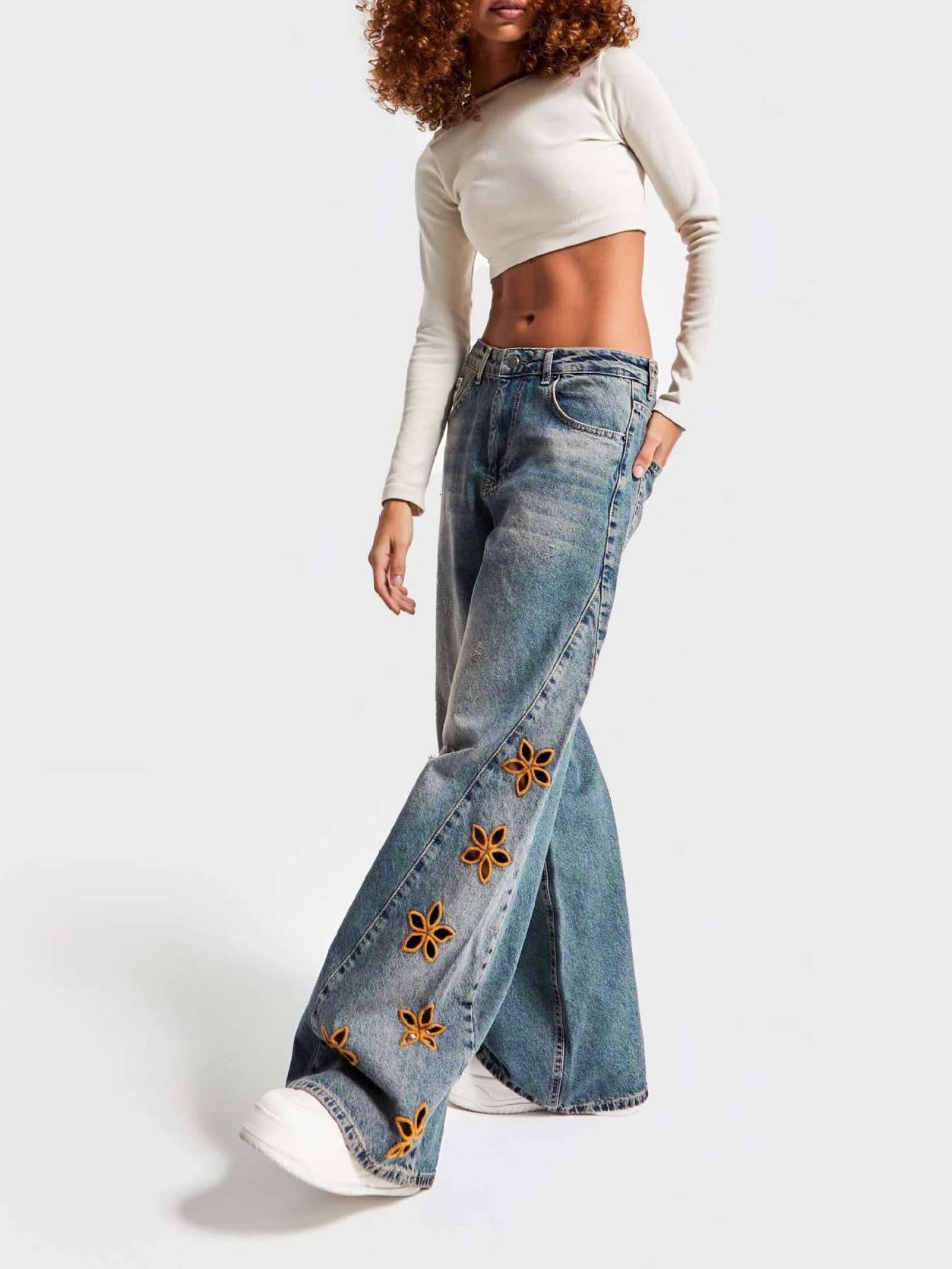 Blue Floral cutout Embroidered Distressed jeans for wholesale on Faire4