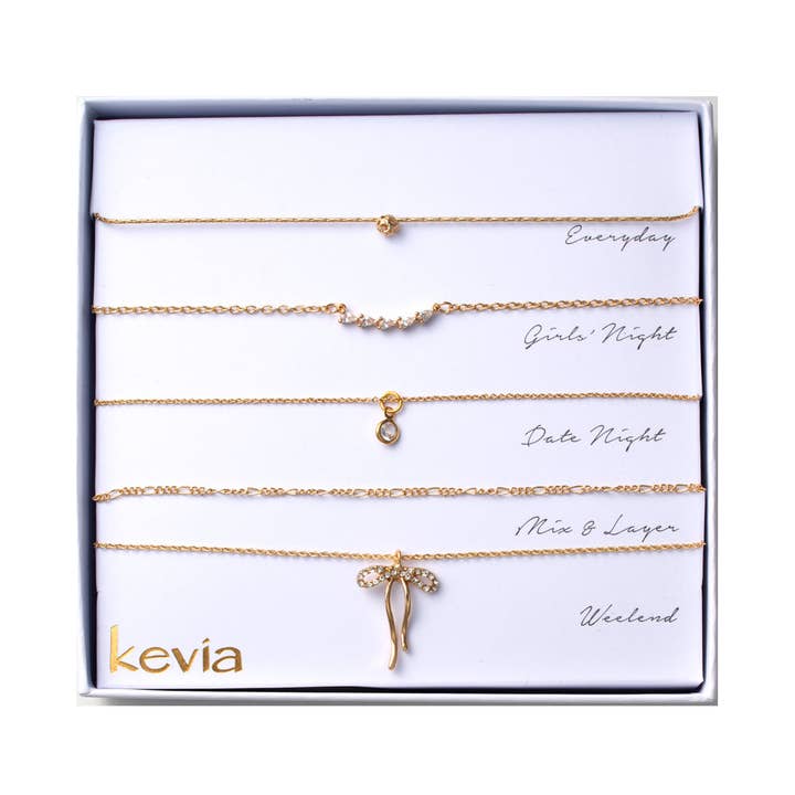 Gold Crystal Bow and Solitaire Necklace Set for wholesale by Kevia