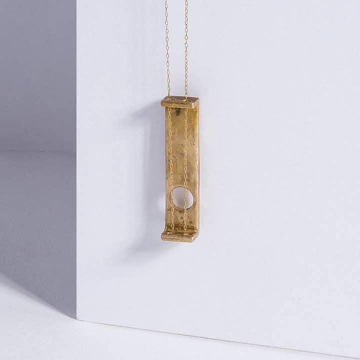 String Instrument Necklace for wholesale by Metalepsis Projects