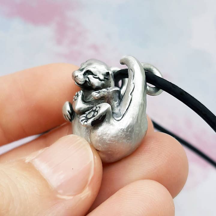 The Sparkling Pebble – wholesale Pendant/charm necklace – Otter Pendant in Silver Plated Pewter