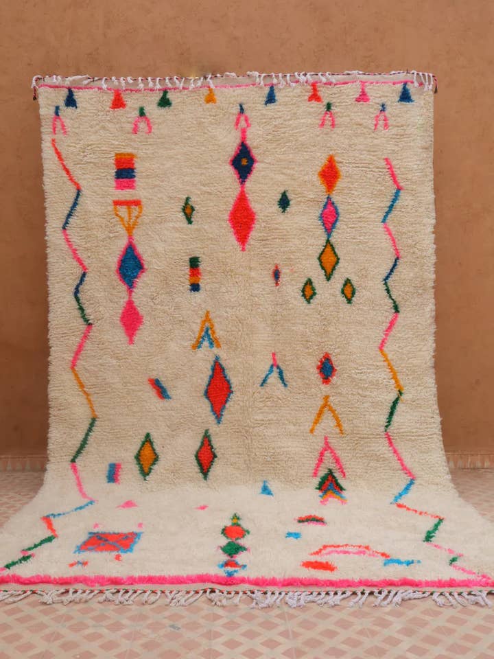 Azilal Berber Rug White with Fluorescent Colored Patterns Pink Edges for wholesale by Néda