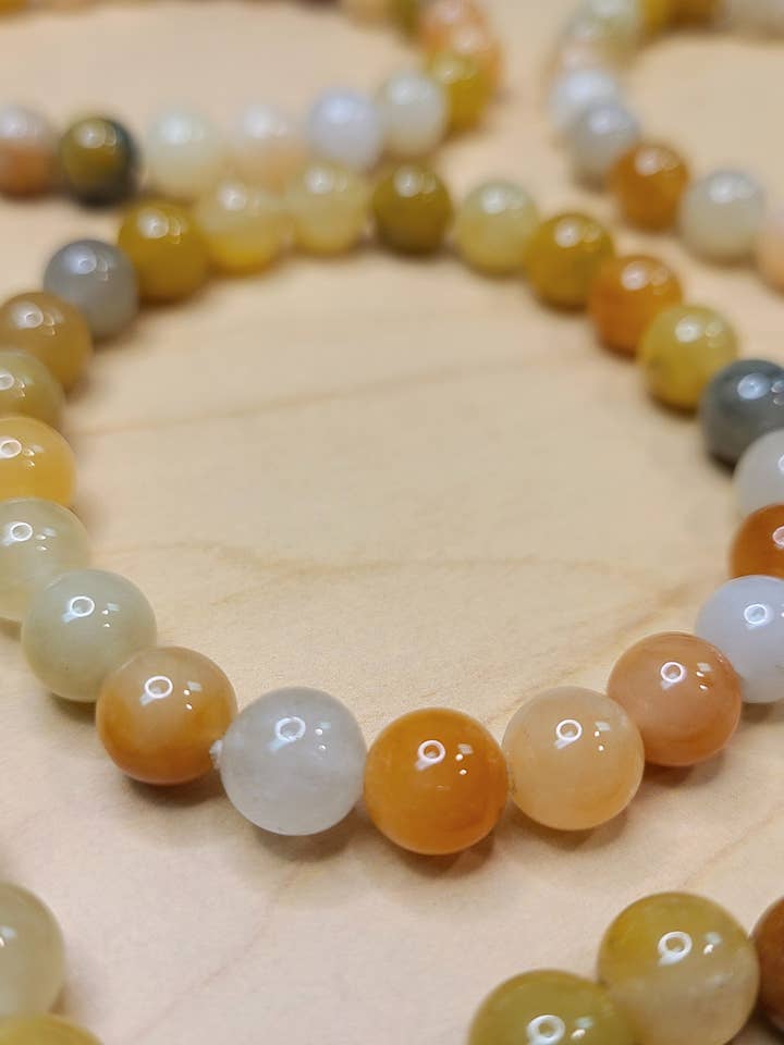 Bracelet Jade Singe Doré pour la vente par Kiwi's Garden Center