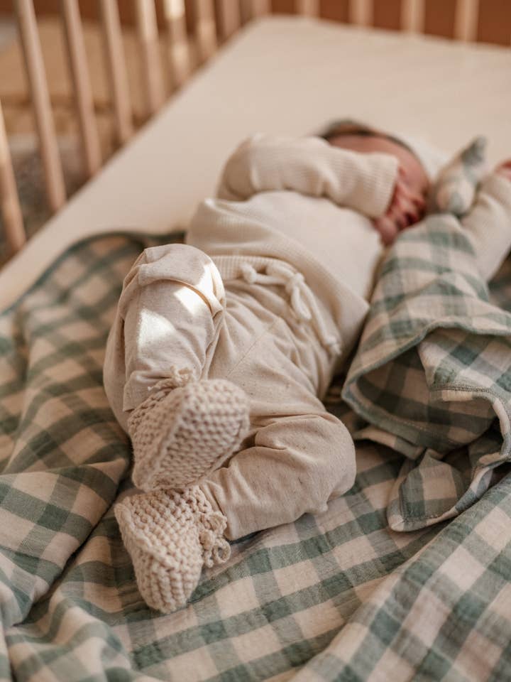 Baby booties / Almond Cream for wholesale by PETITE EvelinaApparel