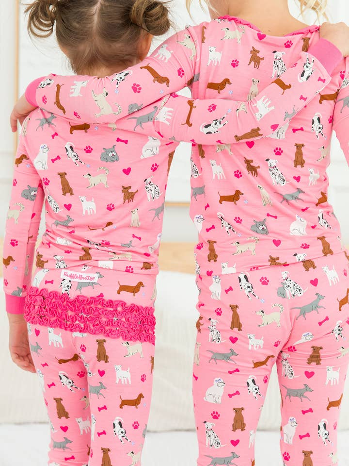 SoftSnooze™ Toddler Girls Bamboo Viscose Pink Puppy Playtime Ruffle Long Sleeve Pajama Set with Signature Rear Ruffles
for wholesale by RuffleButts + RuggedButts