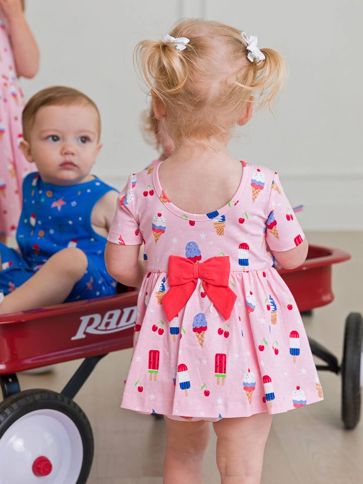 RuffleButts + RuggedButts - Wholesale Romper - Kids - Baby Girls Sweet Freedom Knit Short Sleeve Twirl Romper
0