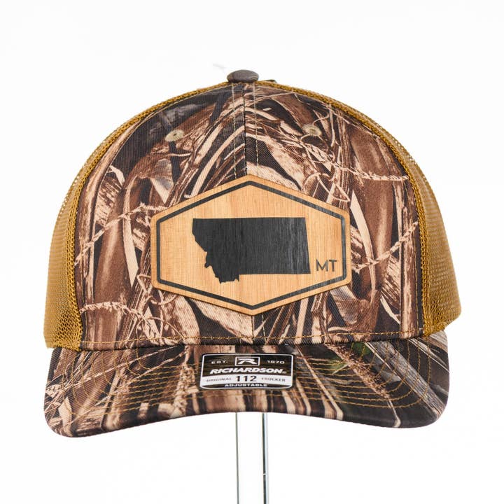 Montana Cherrywood Flexwood Patch on Real Tree Camo Richardson hat for wholesale by Last Best Supply Co