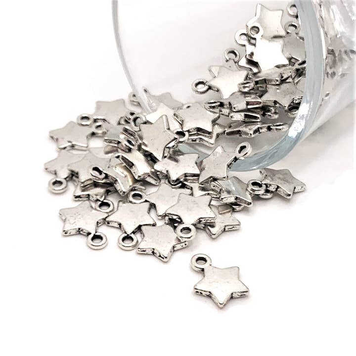 Small Silver Star Charms, 12x9mm for wholesale by Guerrilla Charm