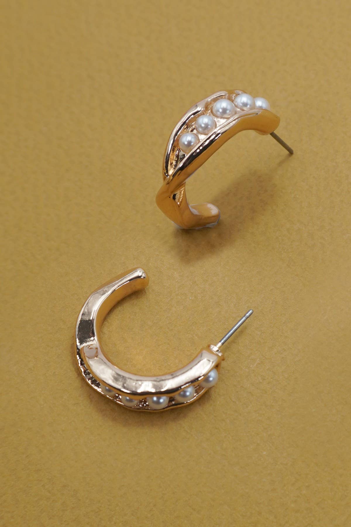 Gold INTERTWINED PEARL HOOP TITANIUM POST EARRINGS | 31E50198 for wholesale on Faire1