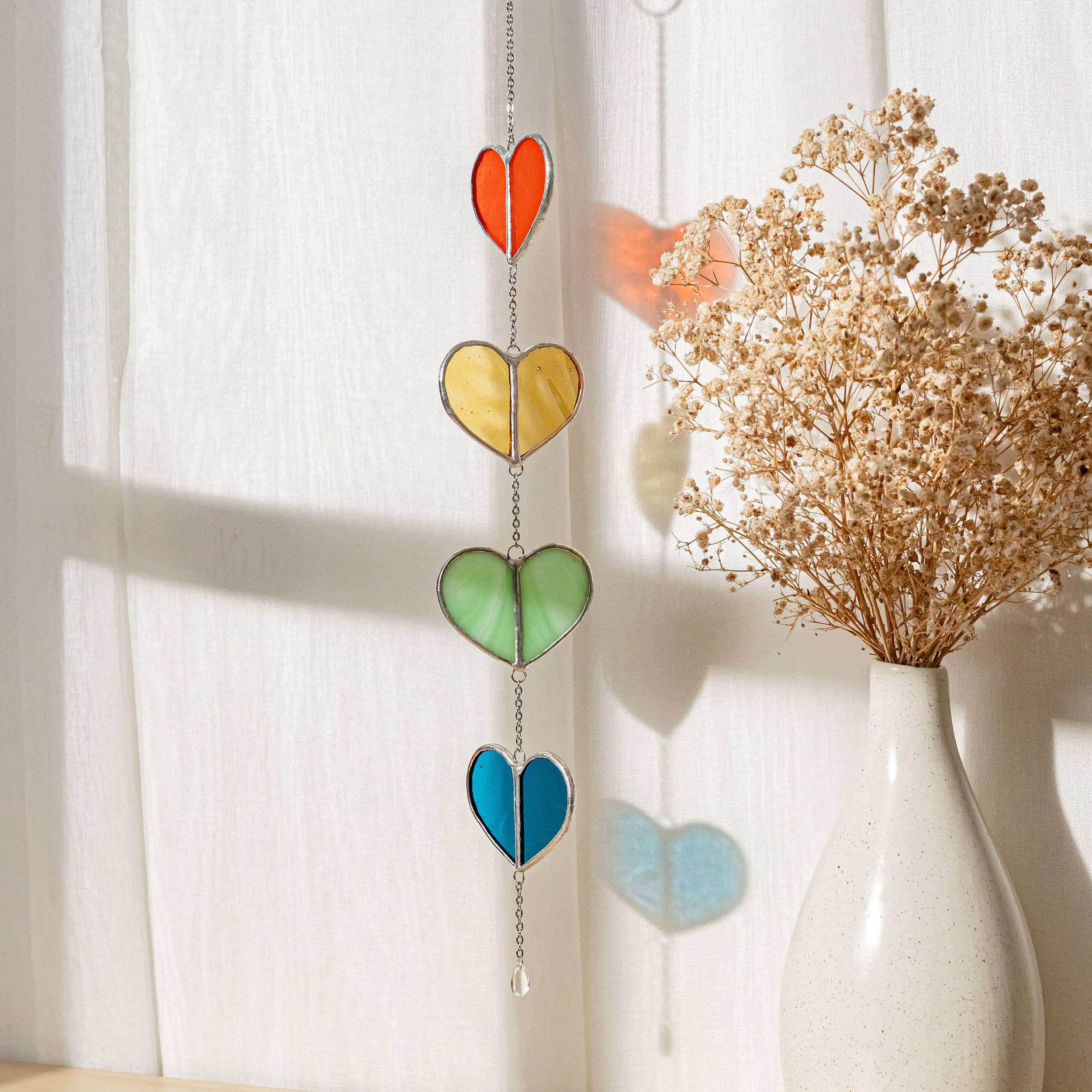 MondoBellissimo - Vendita all'ingrosso Bandierine/Ghirlande - Ghirlanda a cuore in vetro colorato F2211