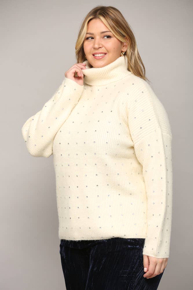 CREMA MAGLIONE A COLLO ALTO IMPREZIOSITO DA STRASS FW9411P in vendita all'ingrosso su Faire2