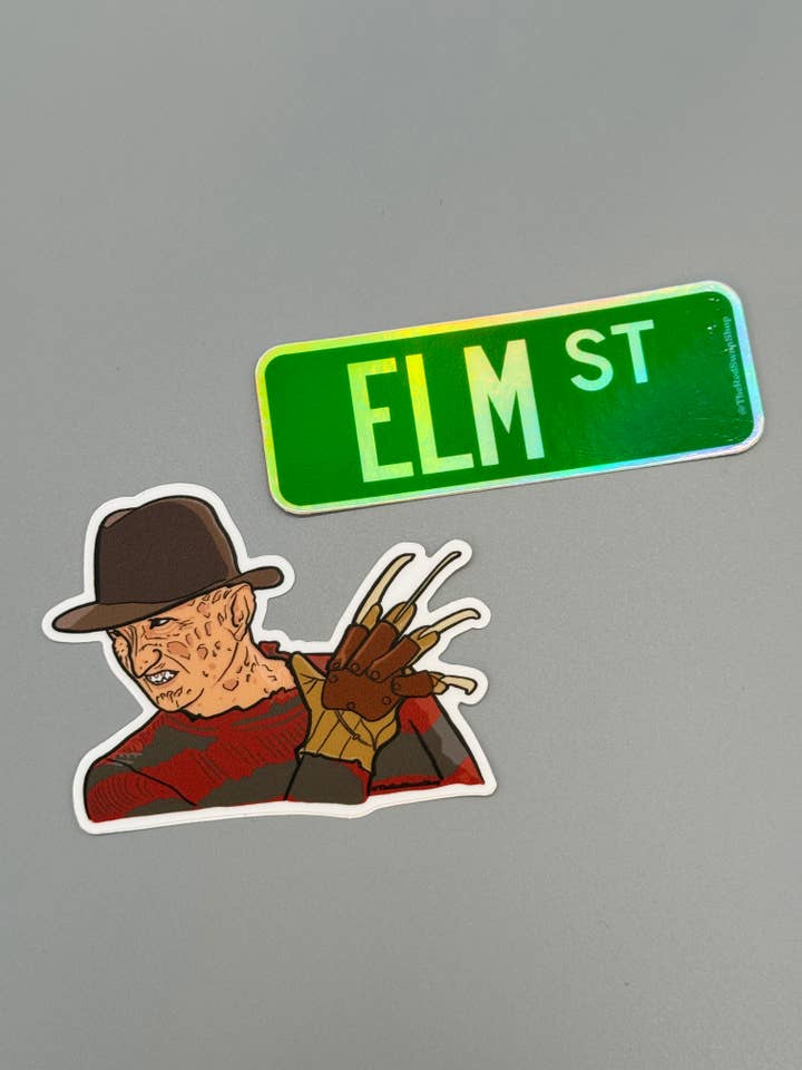 Vinyl Decal - Elm Street Road Sign - Holographic for wholesale by The Red Swan Shop