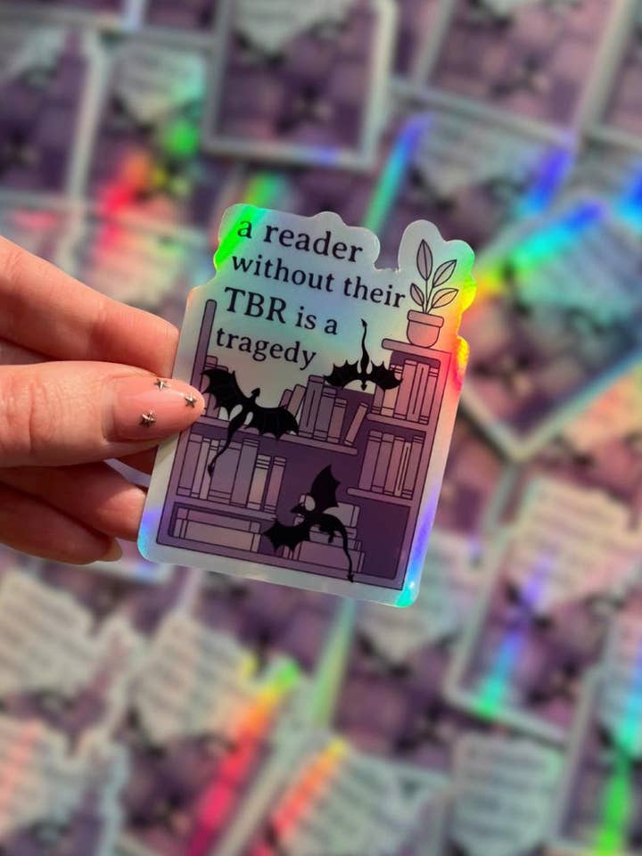 Reader without a TBR is a tragedy holographic vinyl sticker for wholesale by Sacred Hart Co