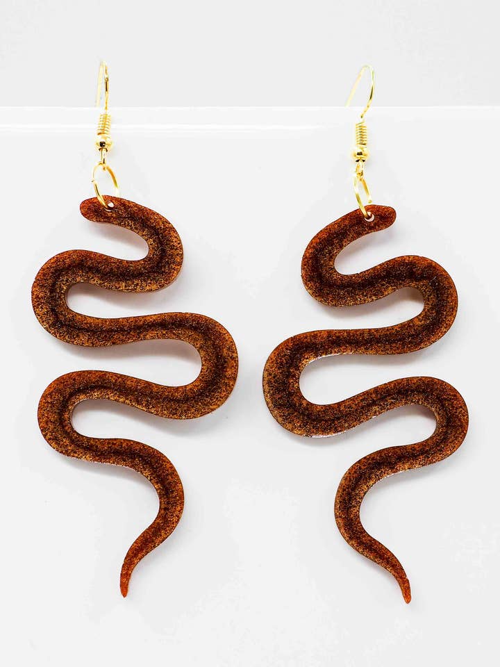 Charmeur de serpent en cuivre pour la vente par West Moon Collective