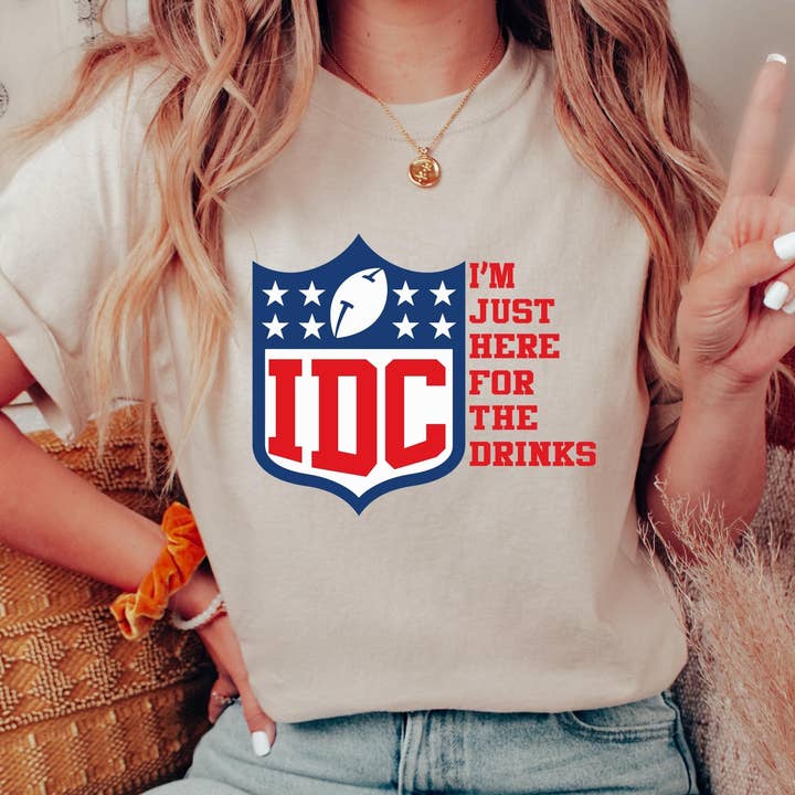 IDC I'm Just Here for The Drinks Football Shirt, Comfort Col for wholesale by Riley Mae Studio
