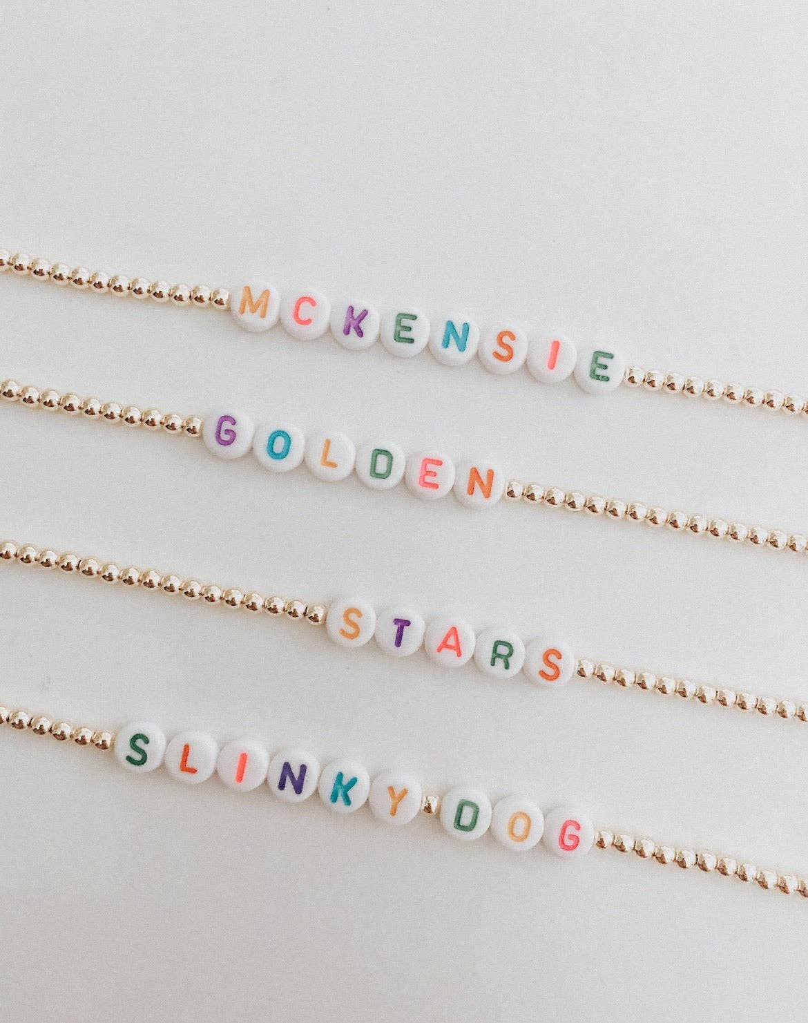 goldenstars - Wholesale Beaded Bracelet - gold custom bracelets with white and rainbow letters0