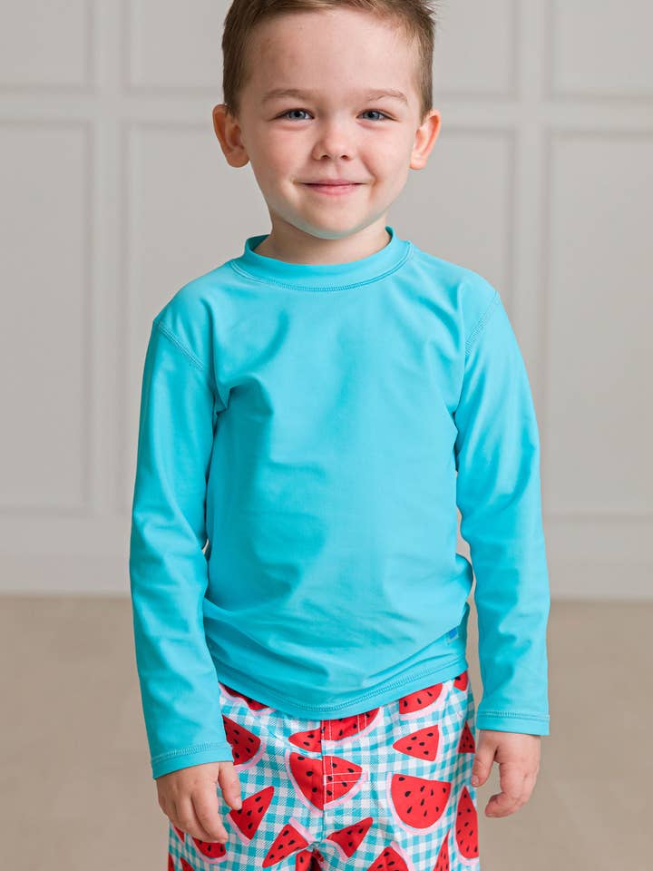 Boys Bright Aqua Long Sleeve Rash Guard
for wholesale by RuffleButts + RuggedButts