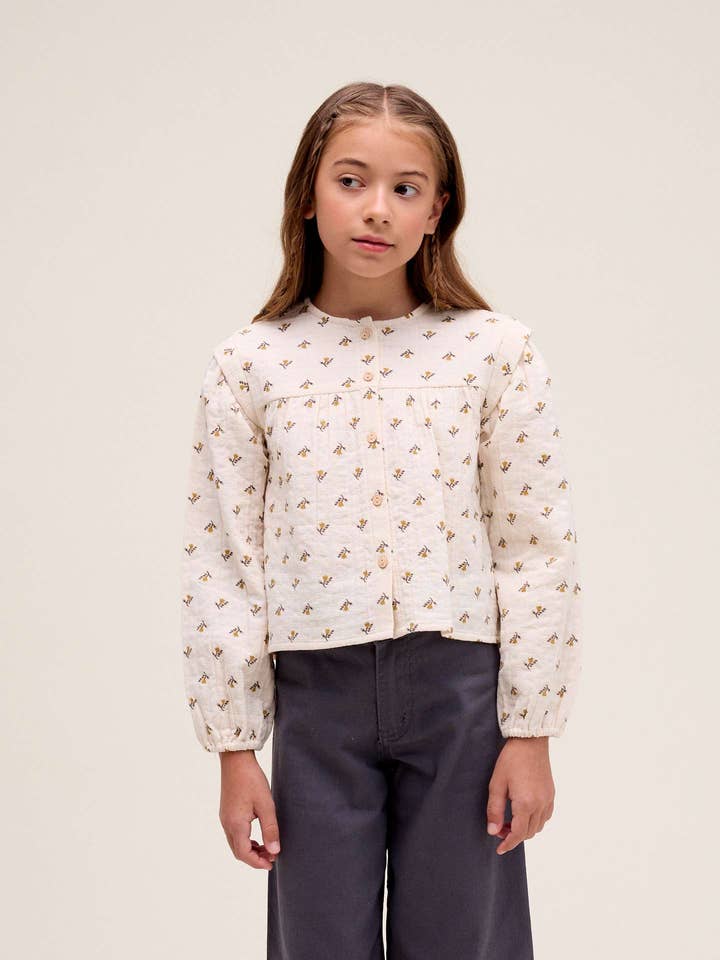 Beige pigebluse med blomsterprint for engroshandel hos Dadati
