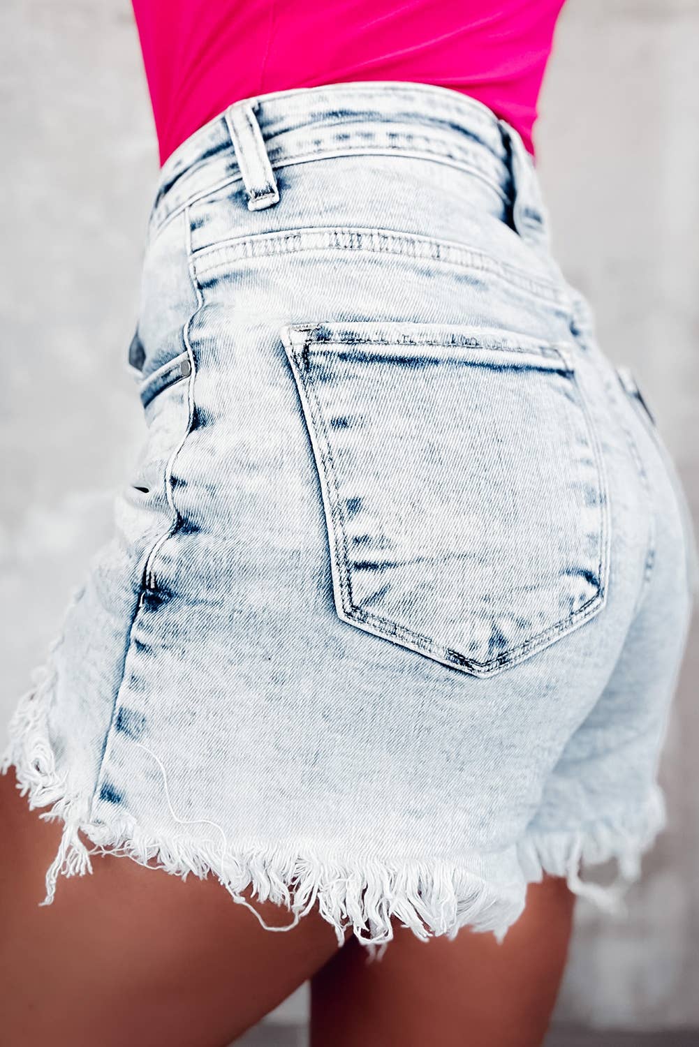Light Blue Acid Wash Crossed Raw Edge Denim Shorts for wholesale on Faire8
