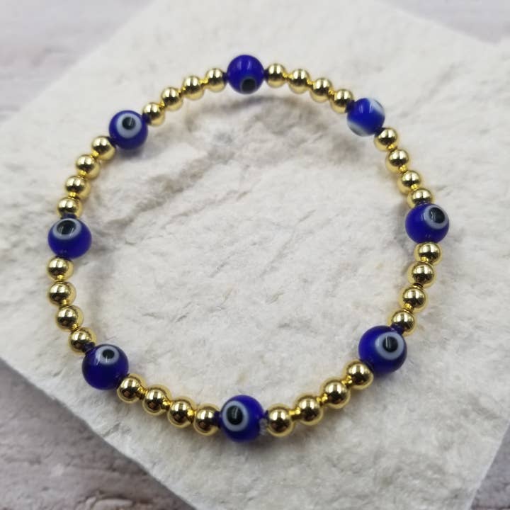 Gold Bead & Evil Eye Bracelet for wholesale by Treasure Wholesale