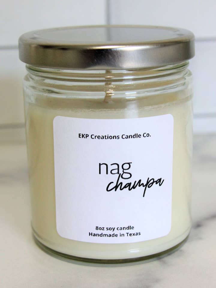 Nag Champa: 8oz Clear Jar Soy Candle for wholesale by EKP Creations Candle Co