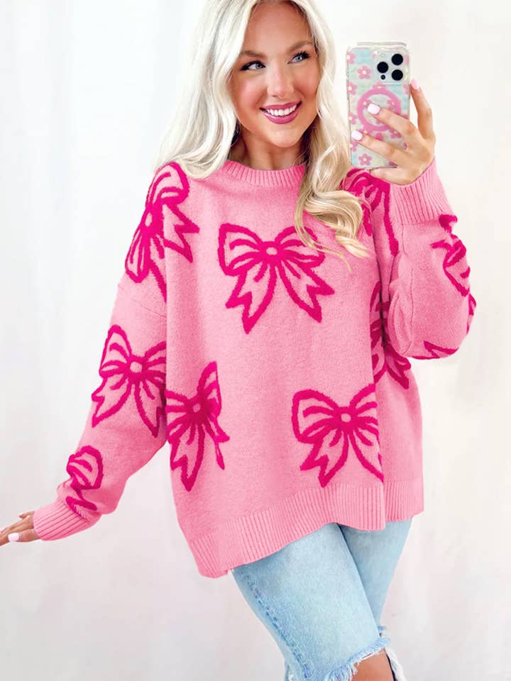 Pink Bow Pattern Drop Shoulder Loose Sweater for wholesale on Faire2