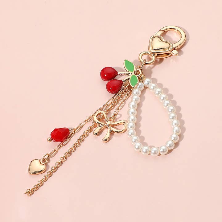 Sensibling Corp. - Wholesale Keychain - Women's - Enamel Cherry Bow Heart Charm Drop Pearl Beaded Keychain