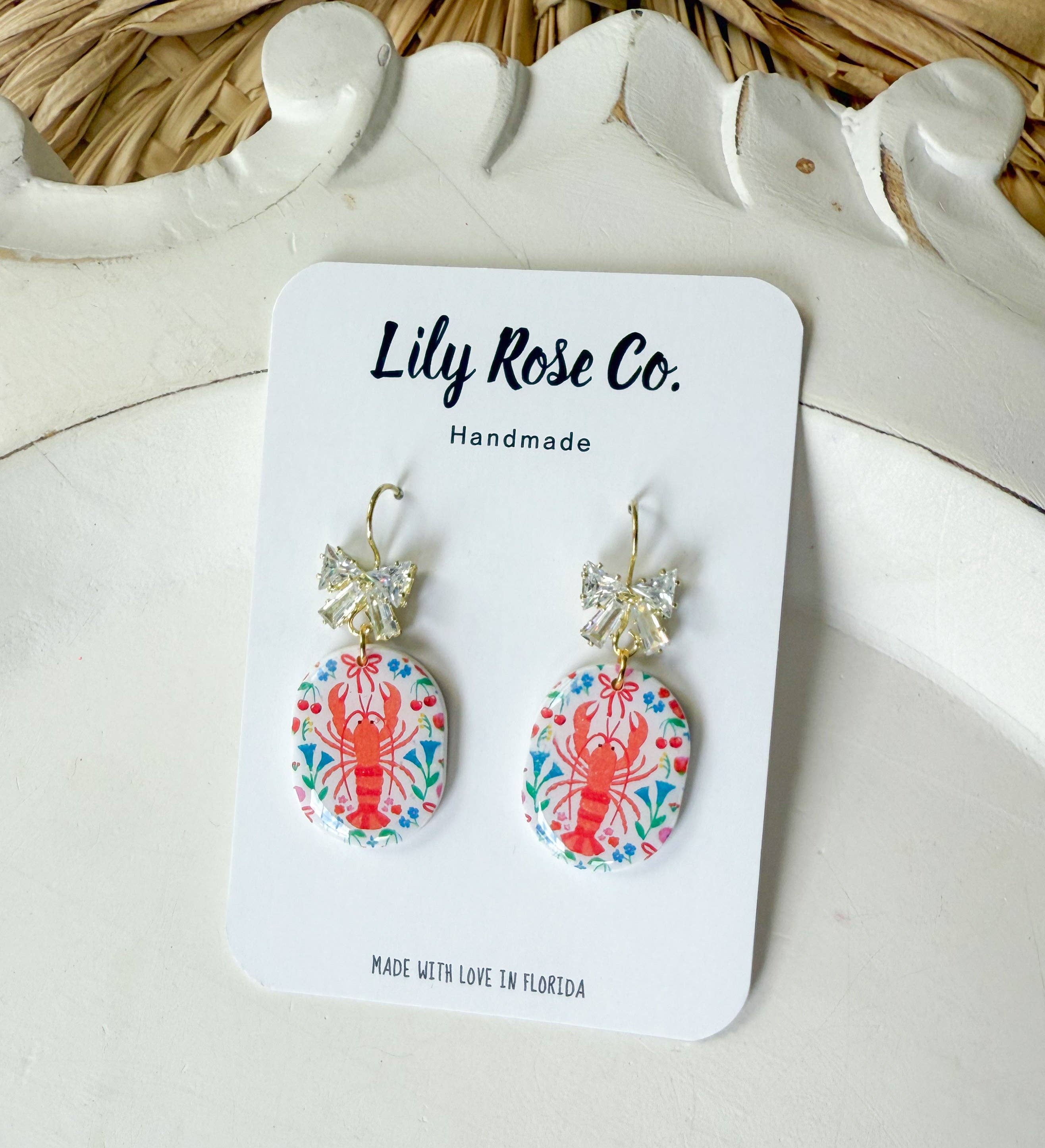 Lily Rose Co. - Wholesale Dangle Earrings - Lobster Print With Bows1