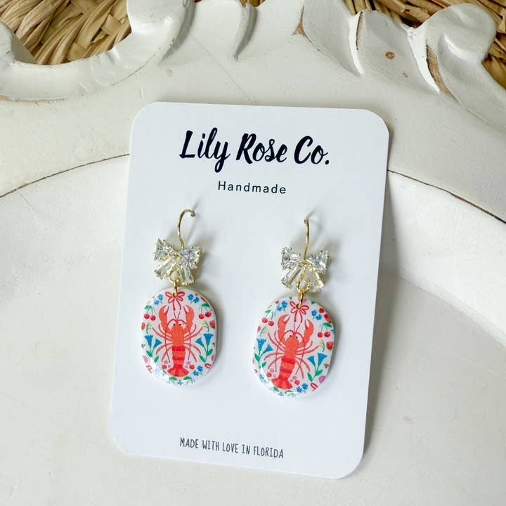 Lily Rose Co. - Wholesale Dangle Earrings - Lobster Print With Bows1