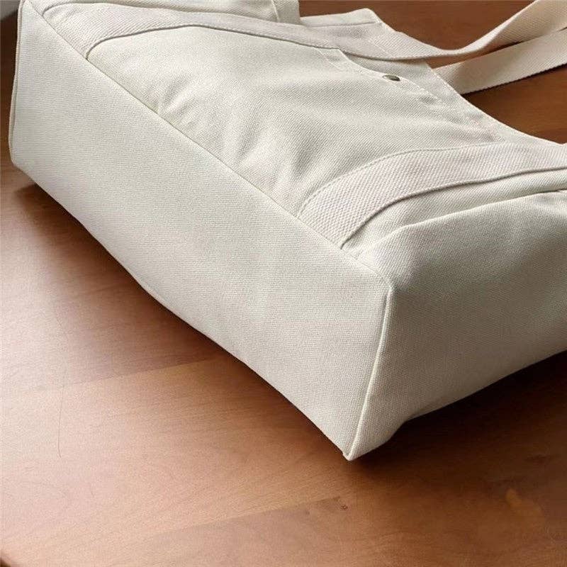 UZ Wholesale Store – wholesale Bärkasse - Dam – Enfärgad canvas-axelväska5