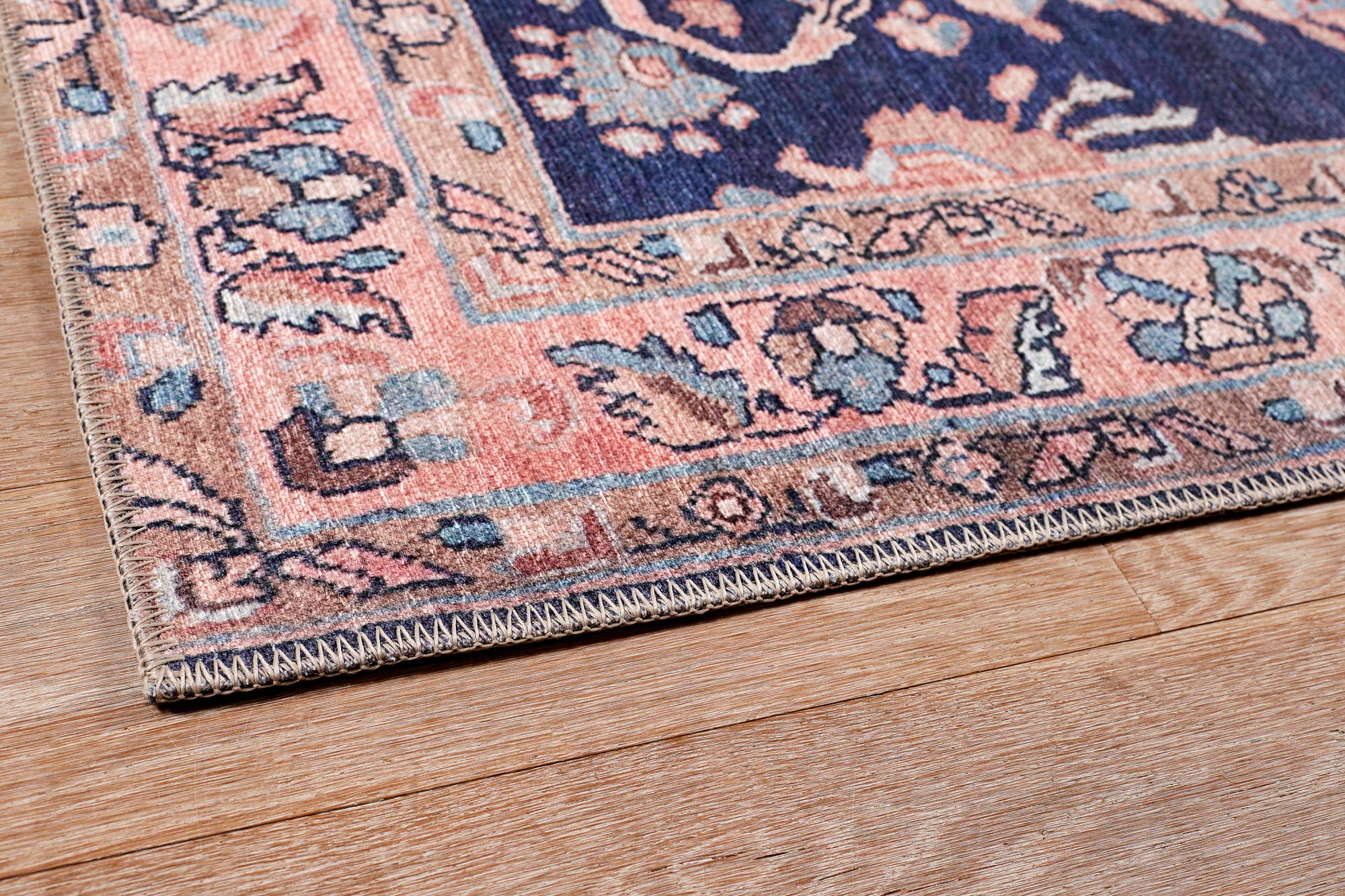 Bergen Floral Navy Area Rug for wholesale on Faire2