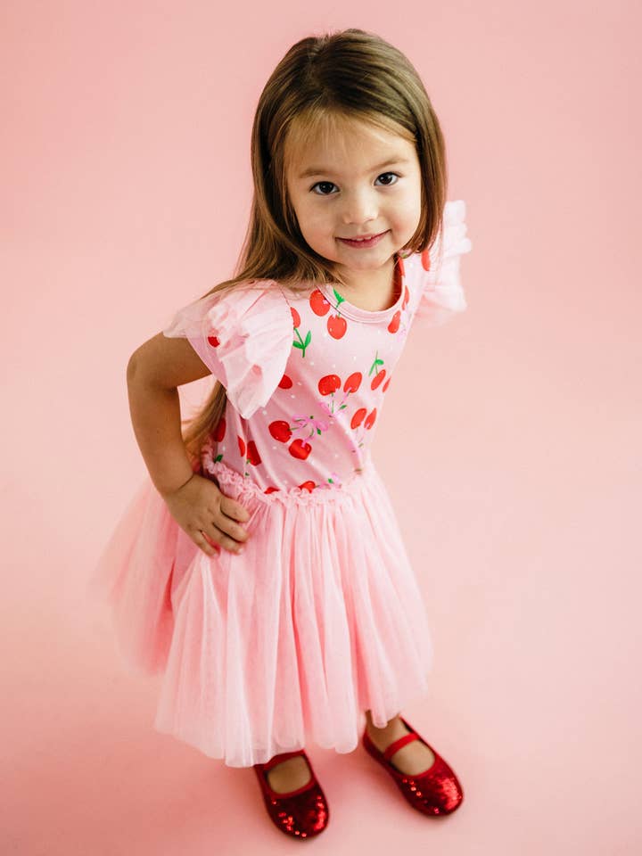 Pink POLKA CHERRY SHORT SLEEVE CIRCUS FRILL DRESS for wholesale on Faire3