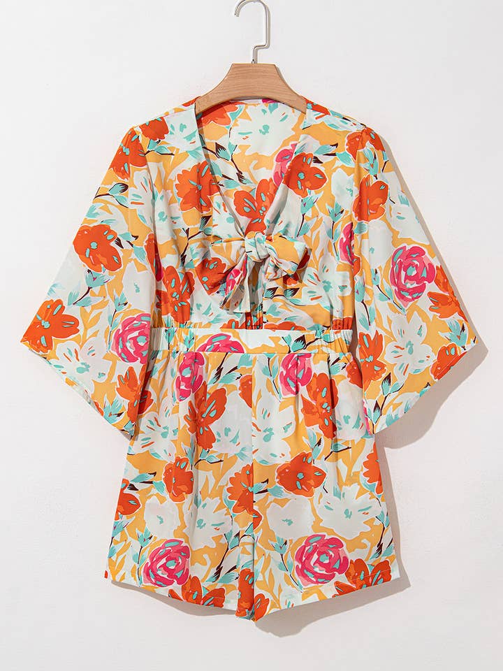 Orange Blooming Floral Print Front Tie Romper for wholesale on Faire