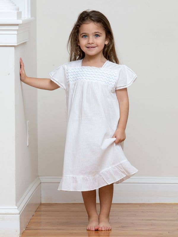 Amelia White Cotton Dress - Smocked for wholesale by Jacaranda Living
