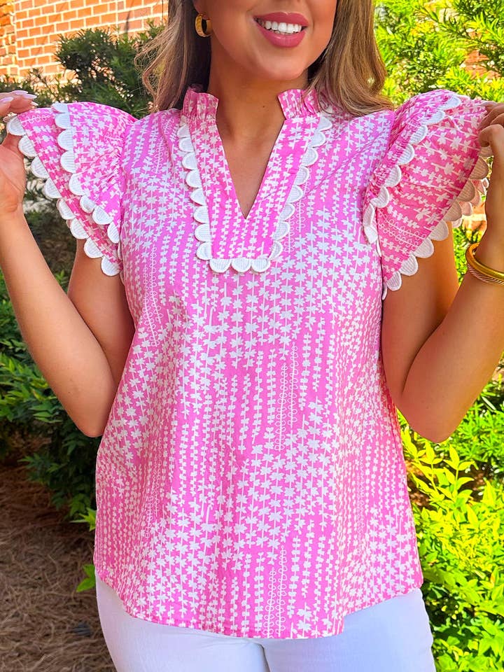 Rosa Blusa con stampa astratta, rifinitura a zigzag, maniche svolazzanti e scollo a V con intaglio. in vendita all'ingrosso su Faire0