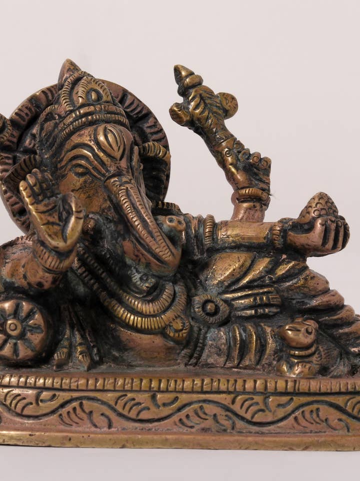 4" Small Reclining Chaturbhuja Lord Ganesha | Brass Statue for wholesale by Exotic India Art
