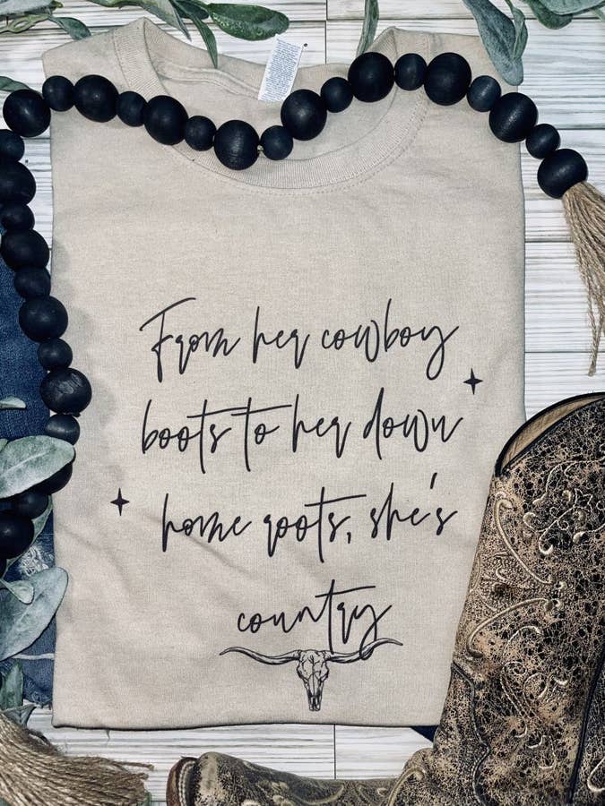 From her cowboy boots (Gildan T-Shirt) for wholesale by 1/2 Penny Wholesale