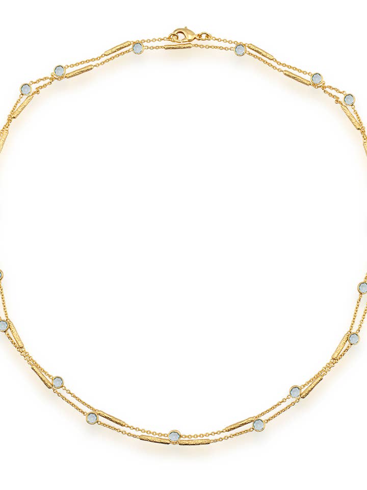 Long blue topaz necklace with textured tube spacers for wholesale by AJS Design Studio