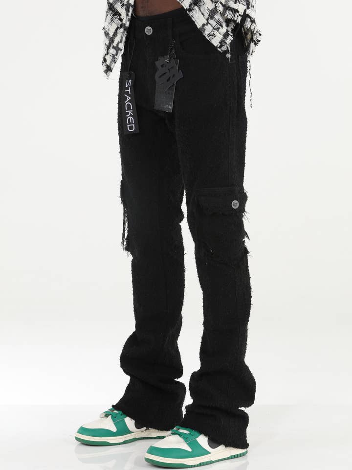 Stylo sorte texturerede flare jeans med stacked design for engroshandel hos Stylo