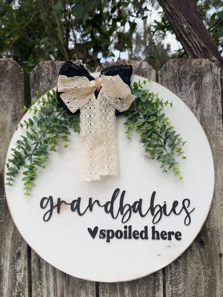 Grandbabies Spoiled Here Door Hanger for wholesale by MaeLynn’s