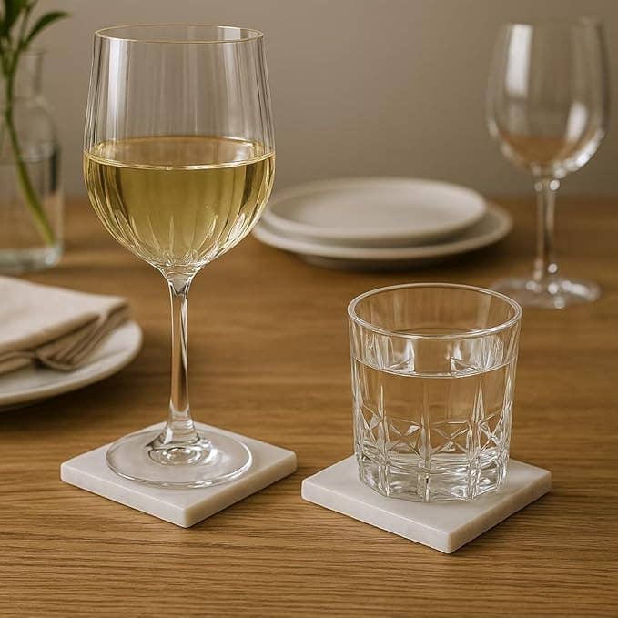 Kalu Creations - Wholesale Coasters - Set of 4 square coasters in white Carrara marble 10x10 cm. Elegant and natural, perfect for protecting tables and surfaces. Italian craftsmanship, stain and scratch resistant.2