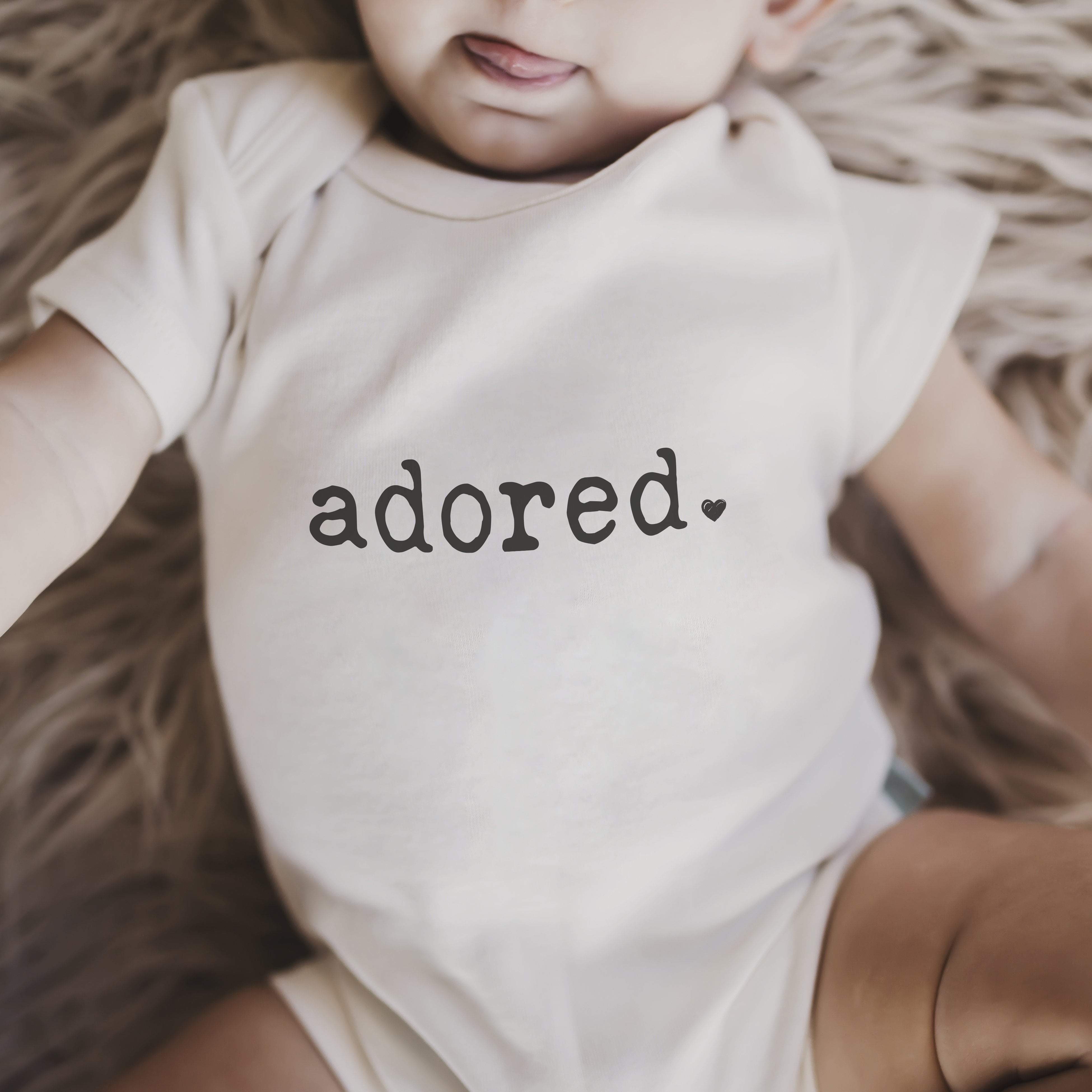 Default baby graphic organic  bodysuit | adored for wholesale on Faire1