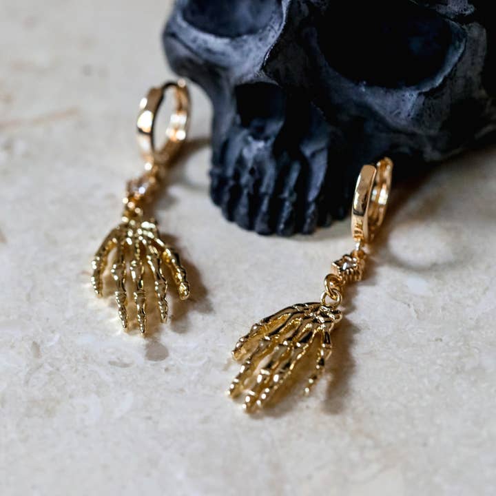 The Gilded Witch - Wholesale Huggie Earrings - Skeleton Hand Huggie Earrings: Gothic Halloween Jewelry1