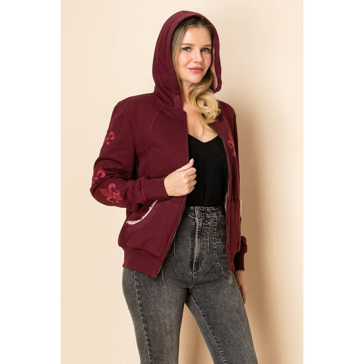 GIACCA IN MAGLIA A MANICHE LUNGHE CON POLSINI E RICAMO per la vendita all'ingrosso da parte di VOCAL