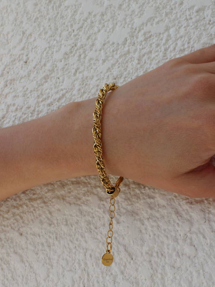 Geflochtenes Kordelarmband Orosei goldfarben | Hergestellt in Frankreich für den Großhandel von Caprice Paris