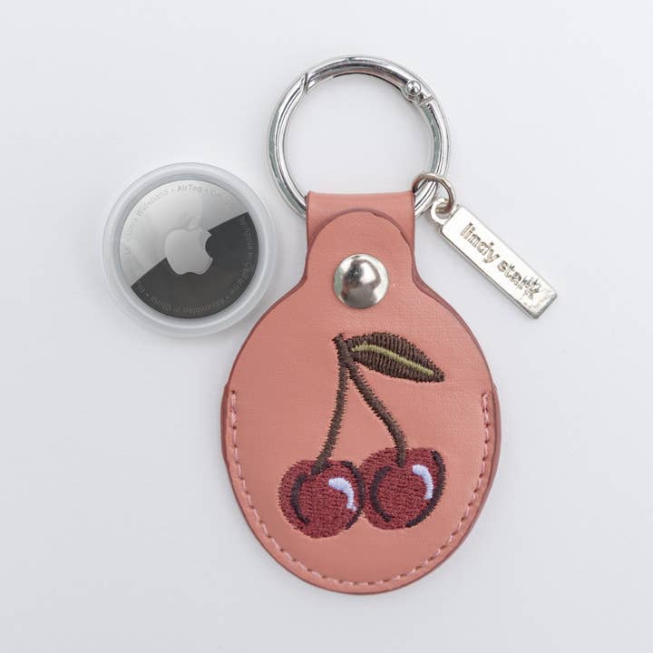 Cherry Embroidered Leather AirTag Keychain/Bag Charm for wholesale by Lindy Stark Designs